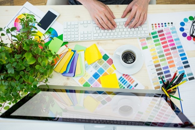 hands-of-male-graphic-designer-using-computer_1170-873